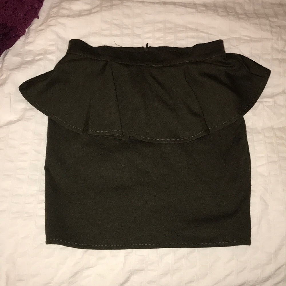 Green peplum skirt